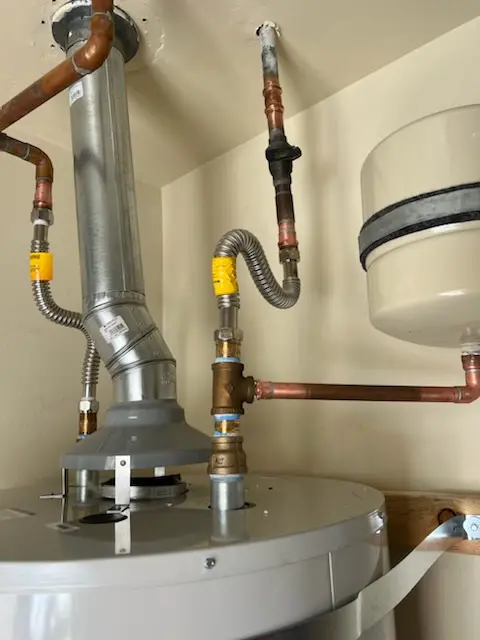 Water heater installation and plumbing repair in Comus